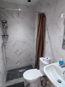 Koupelna v ubytování Appartement No 6 vue sur mer au loin