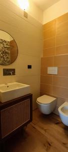Kúpeľňa v ubytovaní Hotel Arimannia