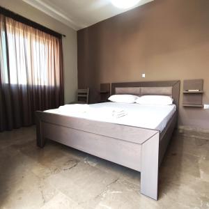 Posteľ alebo postele v izbe v ubytovaní VASO'S APARTMENTS + 23 fotografií
