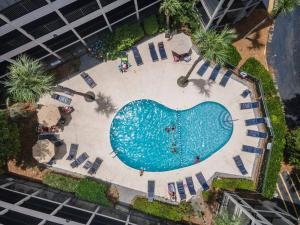 an overhead view of a swimming pool at a resort at Sunset Dunes Direct Beach Access in Hilton Head Island