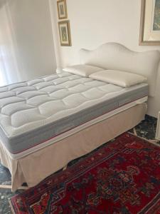 A bed or beds in a room at Attico San Francesco