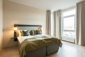 Letto o letti in una camera di Home Hotel Helma