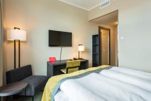Letto o letti in una camera di Home Hotel Helma