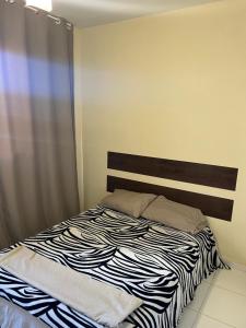 Postel nebo postele na pokoji v ubytování Apartamento em Capitólio