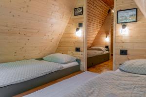 Postel nebo postele na pokoji v ubytování Viktorija chalet