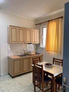 Kuchyň nebo kuchyňský kout v ubytování Duka Rooms
