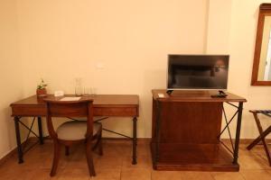 TV a/nebo společenská místnost v ubytování HOTEL COLLI