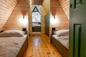 Postel nebo postele na pokoji v ubytování Viktorija chalet