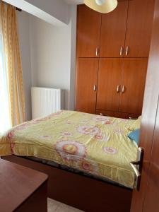 Postel nebo postele na pokoji v ubytování Katerini Family Home