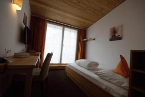 Postel nebo postele na pokoji v ubytování Gasthof zum goldenen Löwen