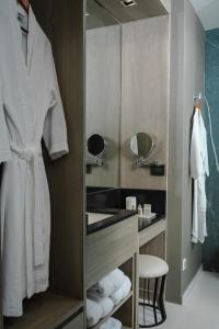 a bathroom with a sink and a mirror at Casa Salles Hotel Boutique in Tequila