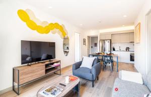 a living room with a couch and a table at Kukun Reforma & Downtown in Mexico City