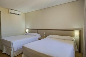 Cama ou camas em um quarto em Viale Tower Hotel