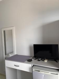 TV a/nebo společenská místnost v ubytování Duka Rooms
