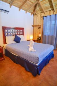 Katil atau katil-katil dalam bilik di Hotel Playa Caribe