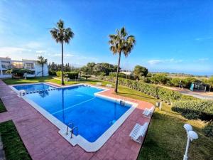 Bazén v ubytovaní Apartment Sol Vinaròs con AA Wi-Fi a primera línea y vistas al mar. alebo v jeho blízkosti