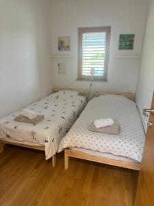 Postel nebo postele na pokoji v ubytování Capo House