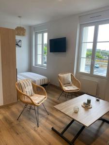 TV a/nebo společenská místnost v ubytování Appartement vue Port