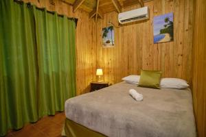 Katil atau katil-katil dalam bilik di Hotel Playa Caribe