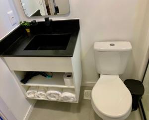 Vannituba majutusasutuses LOFT confortável e moderno com garagem perto da FURB e Vila Germânica