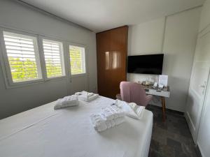 Postel nebo postele na pokoji v ubytování Casa Cristiano