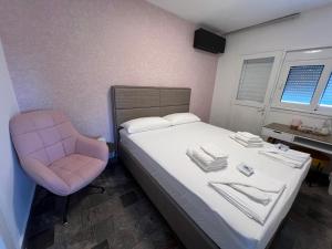 Postel nebo postele na pokoji v ubytování Casa Cristiano