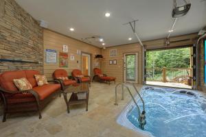 a living room with a jacuzzi tub in a room at Poolin Around in Waldens Creek