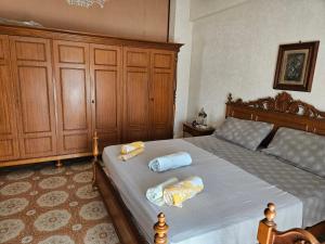 Кровать или кровати в номере Casa vacanza Nonna Rosetta