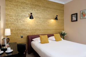 Postel nebo postele na pokoji v ubytování Best Western Plus Hôtel Brice Garden Nice