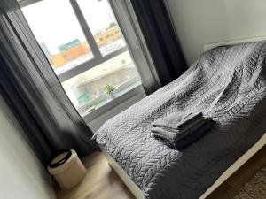 Posteľ alebo postele v izbe v ubytovaní MezzoApart