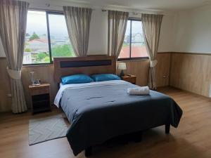 Postel nebo postele na pokoji v ubytování Hotel Centrico 734