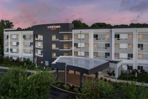 an artist rendering of the exterior of a hotel at Courtyard by Marriott Philadelphia Bensalem in Bensalem