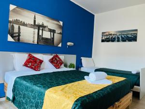 Postel nebo postele na pokoji v ubytování Venice Stay