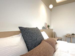 Postel nebo postele na pokoji v ubytování DOME Homestay