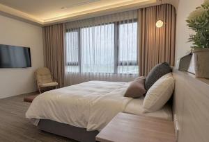 Postel nebo postele na pokoji v ubytování DOME Homestay