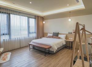 Postel nebo postele na pokoji v ubytování DOME Homestay