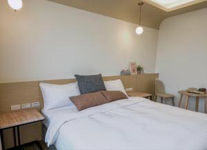 Postel nebo postele na pokoji v ubytování DOME Homestay