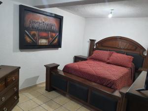 Postel nebo postele na pokoji v ubytování Departamento privado