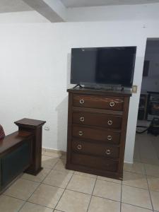 TV a/nebo společenská místnost v ubytování Departamento privado