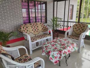 Posezení v ubytování Mansons Homestay