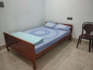 Postel nebo postele na pokoji v ubytování Mansons Homestay