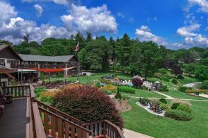 a view of the garden from the deck of a inn at Switzerland Inn in Spruce Pine