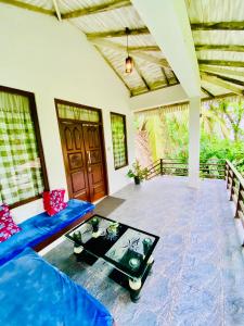 Posezení v ubytování Mountain seaview Cabanas + 37 fotografií