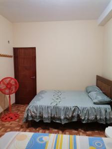 Postel nebo postele na pokoji v ubytování Hospedaje Marvento