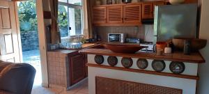 Kuchyň nebo kuchyňský kout v ubytování Kimmy Tahiti House