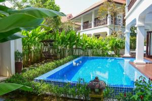 Bazén v ubytování Furama Resort Danang nebo v jeho okolí
