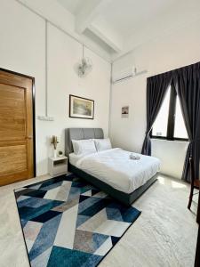 Postel nebo postele na pokoji v ubytování Ferringhi Inn 51 + 37 fotografií