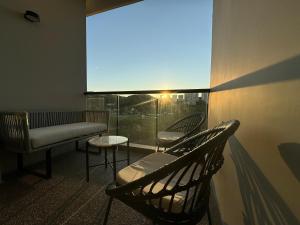a room with a window with a bench and a table at Zantamar Riviera Nayarit at La Cruz de Huanacaxtle in Cruz de Huanacaxtle