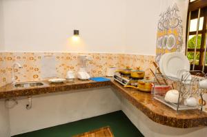 Kuchyň nebo kuchyňský kout v ubytování Hiru Resort Inn