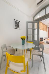 a dining room with a table and chairs at Downtown apartment 2 minutes from Opera House in Budapest